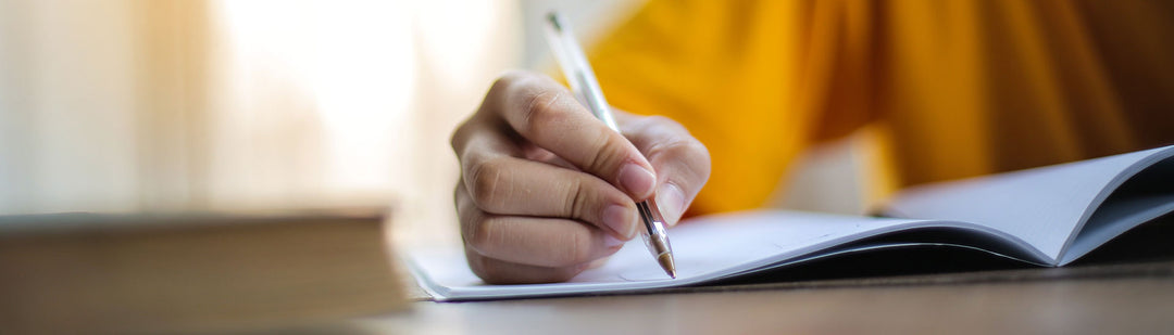 Writing in a Notebook